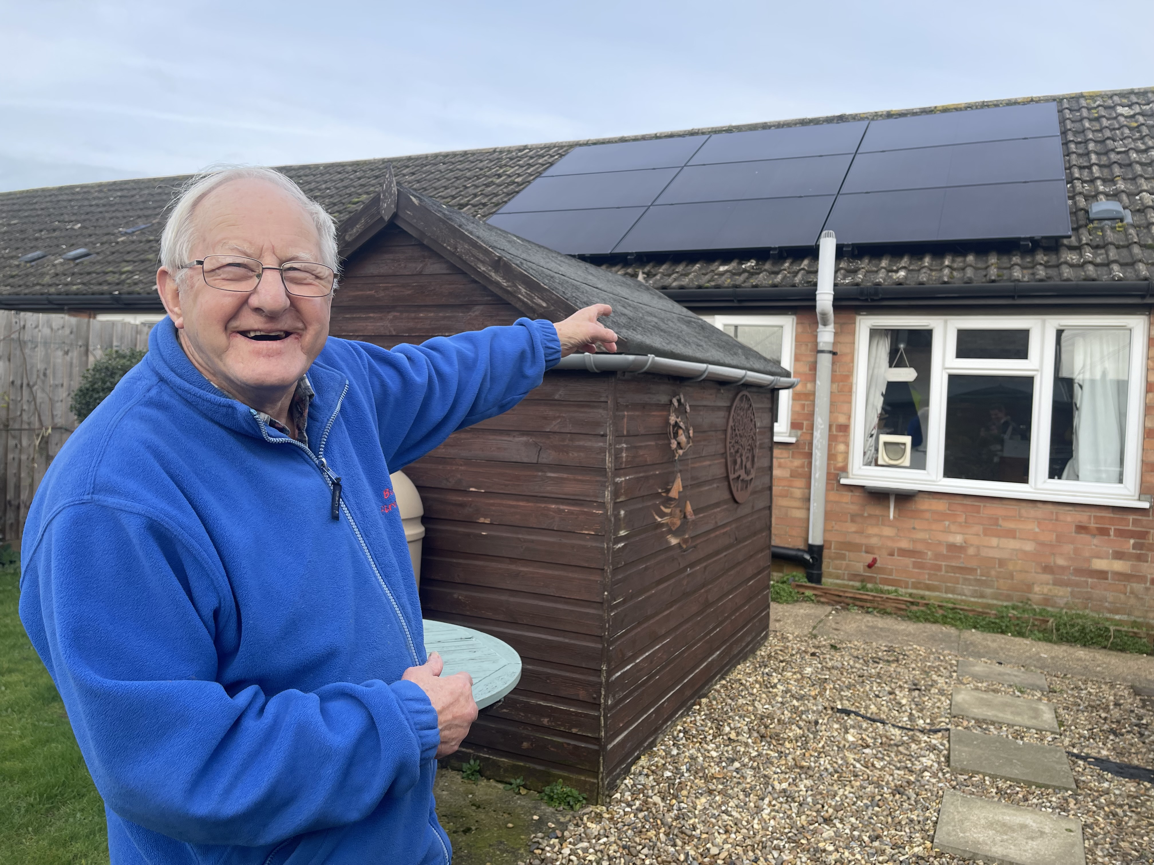 tenant pointing to solar panels