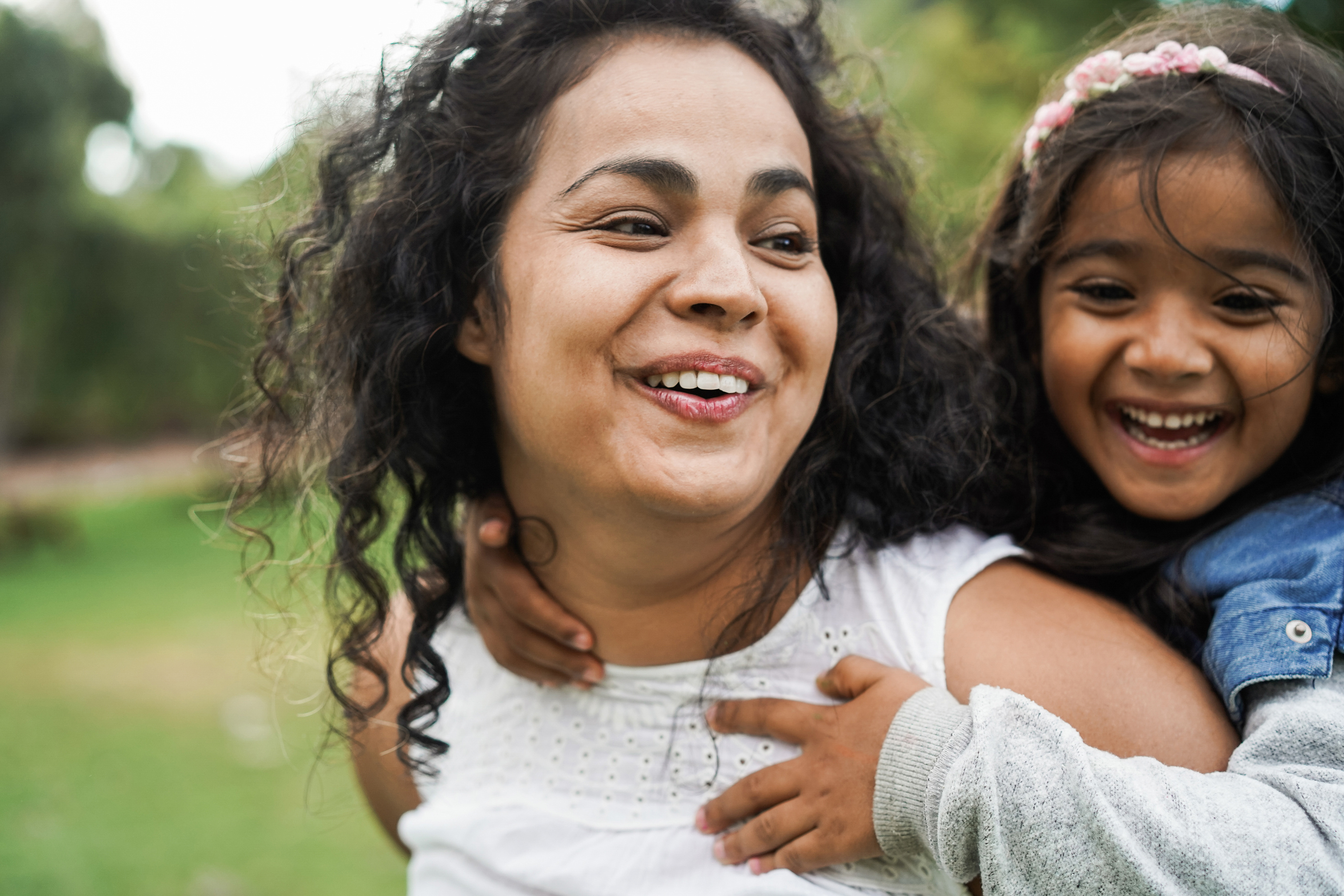Mum and daughter playing outside